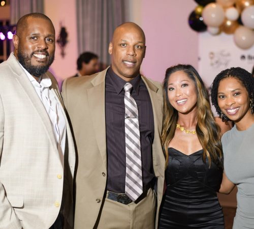 Group of people smiling at event