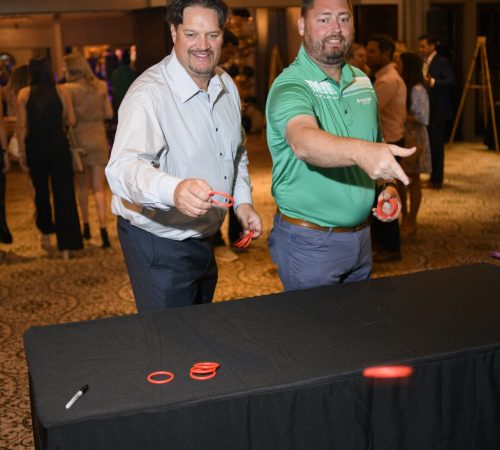 Men playing ring toss